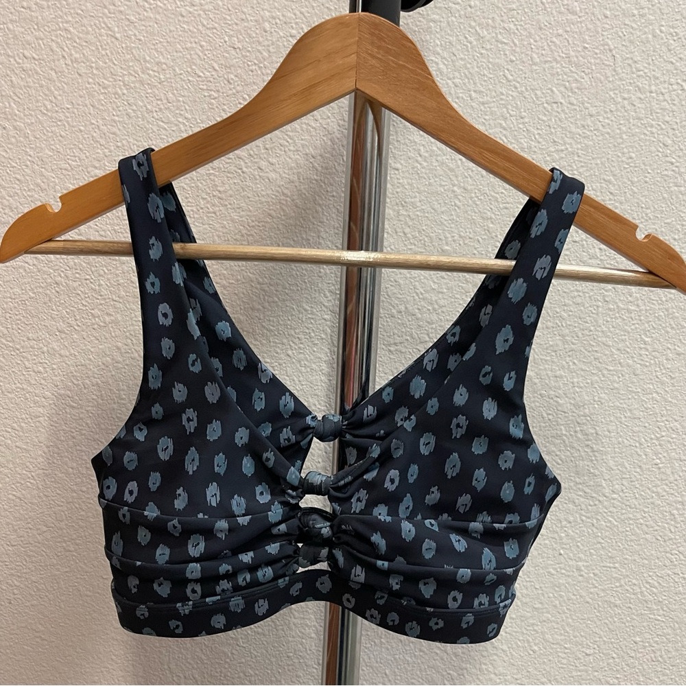 SOUL activewear sports bra, blue with pattern and cut outs, size Small